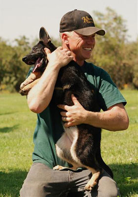 german shepherd puppy and Greg